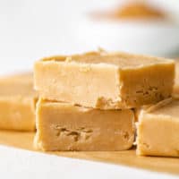 Close up view of a squares of peanut butter fudge.