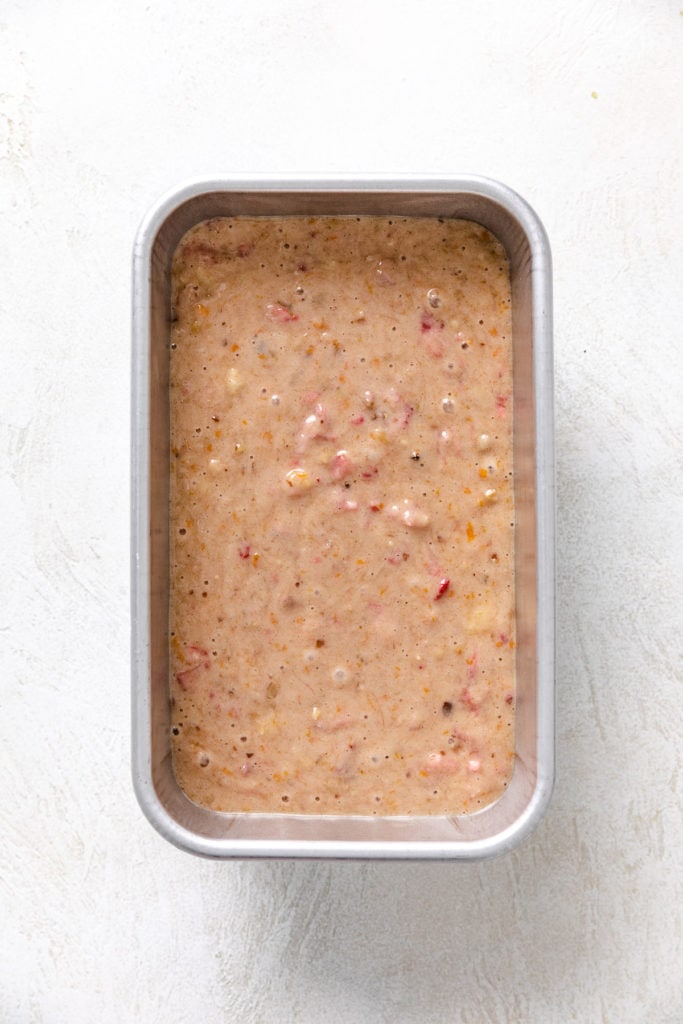 Bread batter in a metal pan.