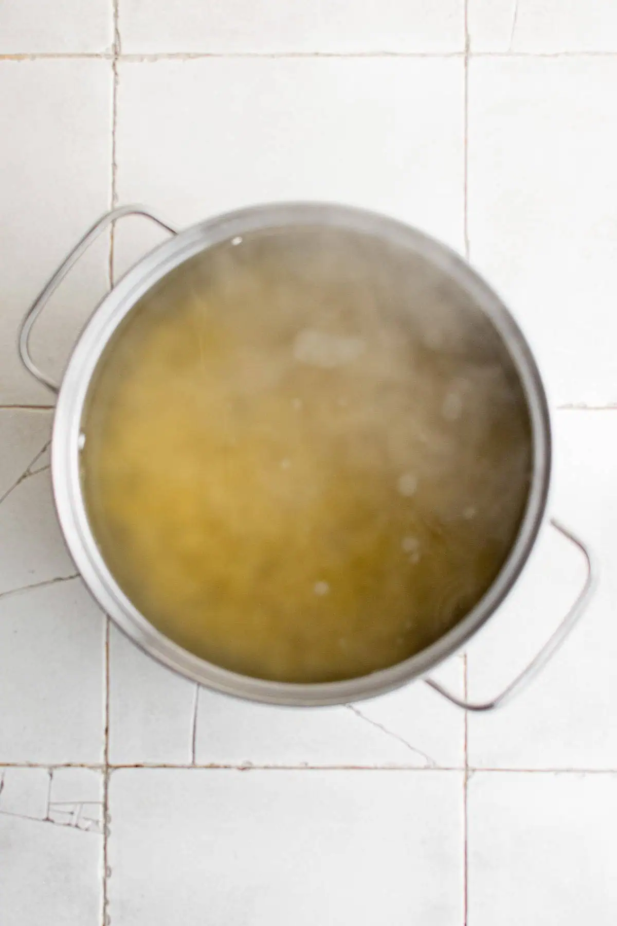Pasta cooking in a pan.