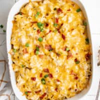 Close up view of cheesy bacon chicken ranch casserole.