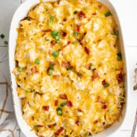 Close up view of cheesy bacon chicken ranch casserole.