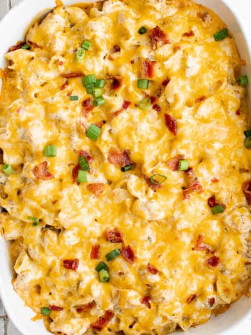Close up view of cheesy bacon chicken ranch casserole.