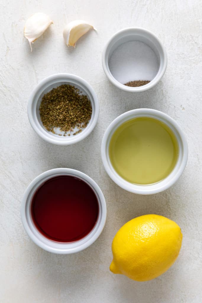 Ingredients needed for Greek salad dressing.