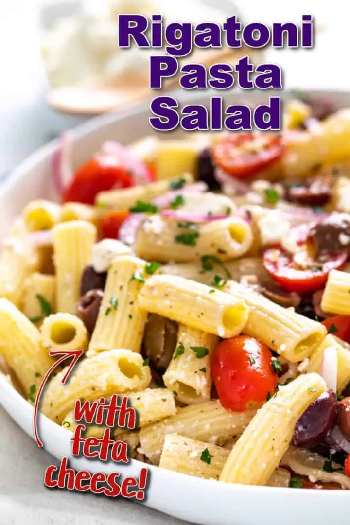 Close up view of a big bowl of pasta salad.