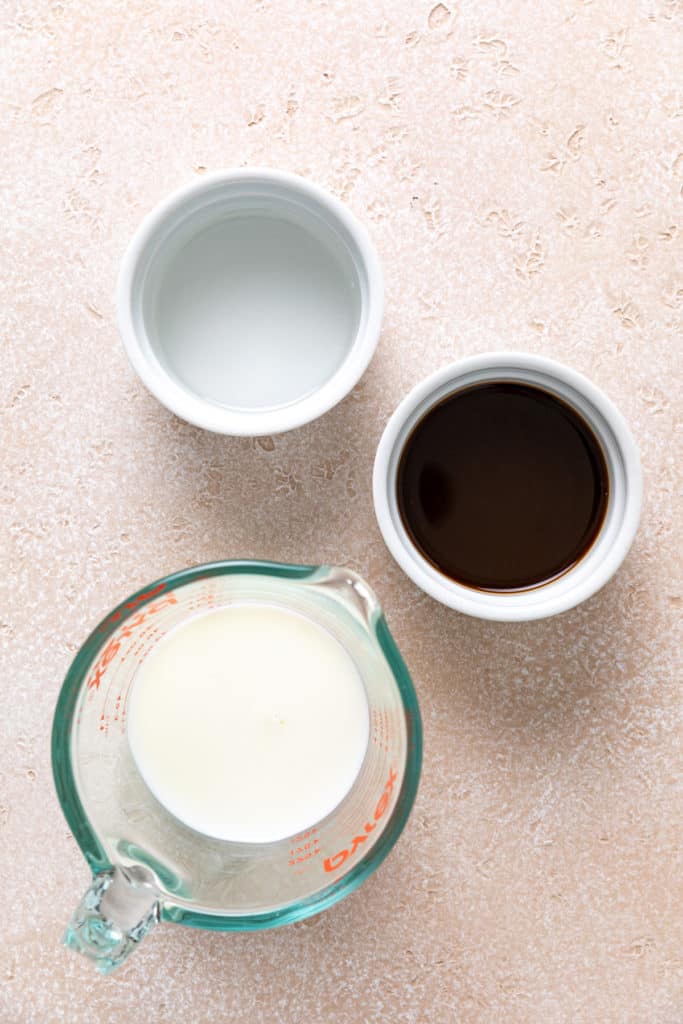 Ingredients used to make an iced white chocolate mocha.