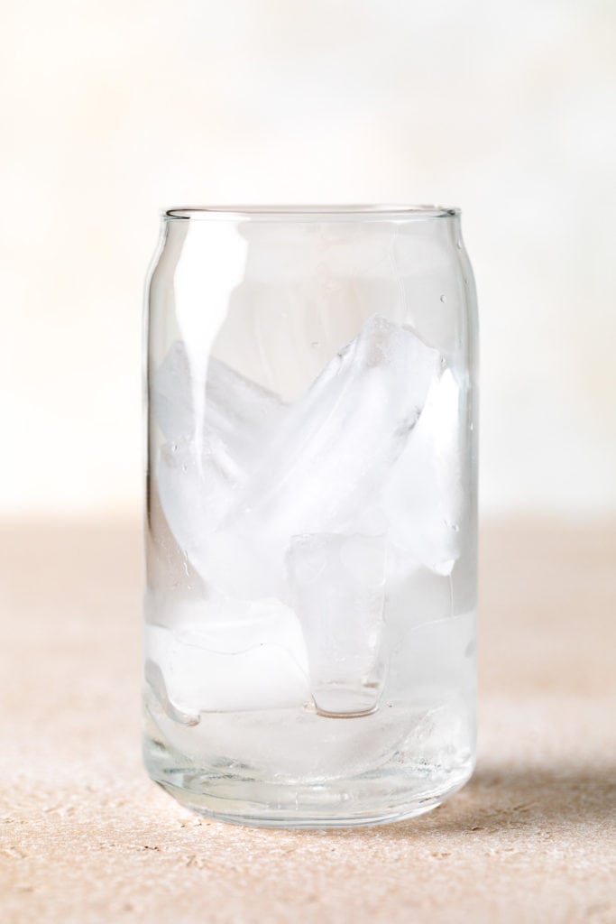 White chocolate syrup in a glass of ice.