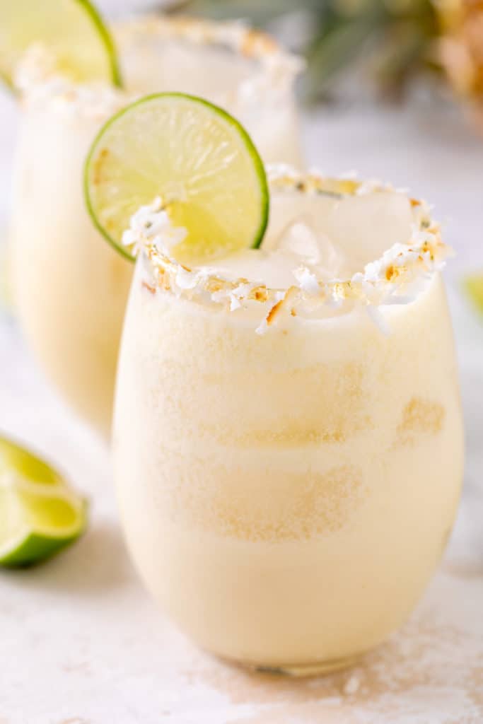 Side view of a tropical margarita on the rocks.