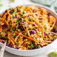 Close up view of a large bowl of ramen noodle salad.