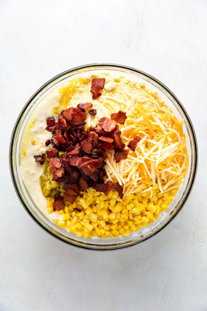 Bacon, cheese, corn, and Jiffy mixed added to cream cheese, sour cream and eggs.