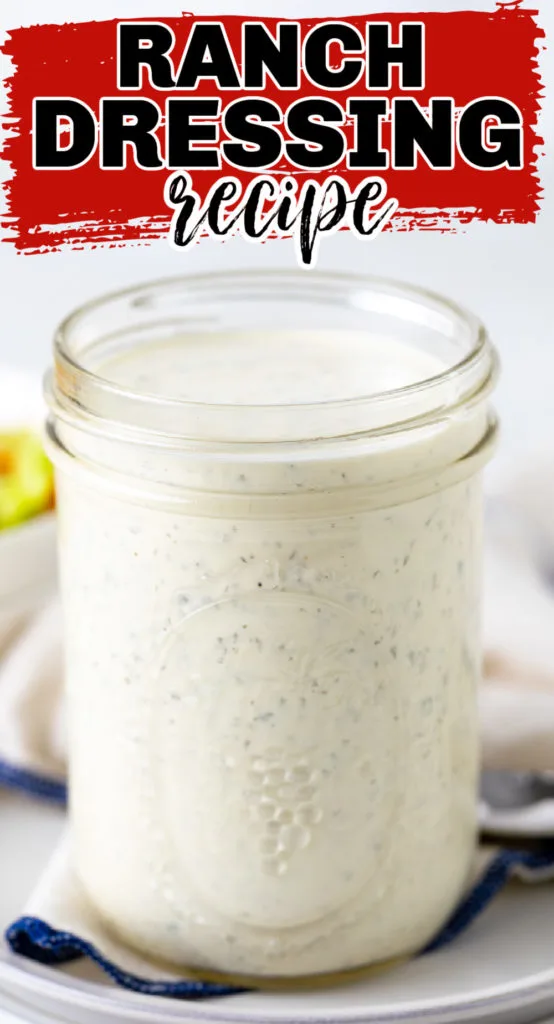 Mason jar filled with ranch dressing.