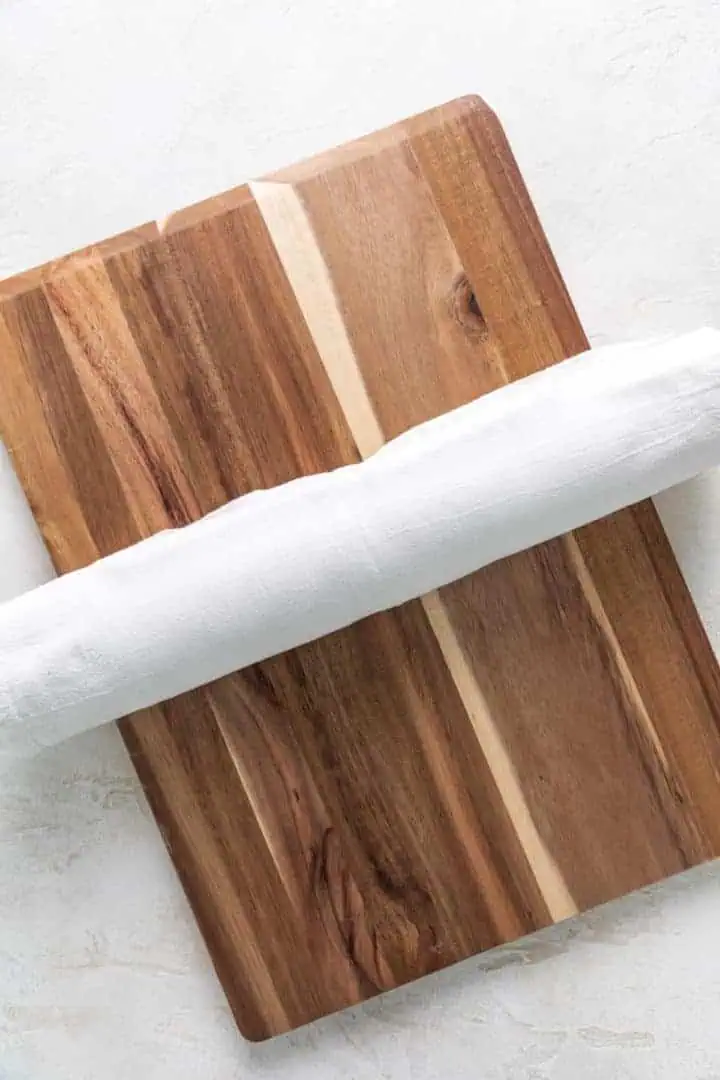 Pumpkin cake rolled in a towel.