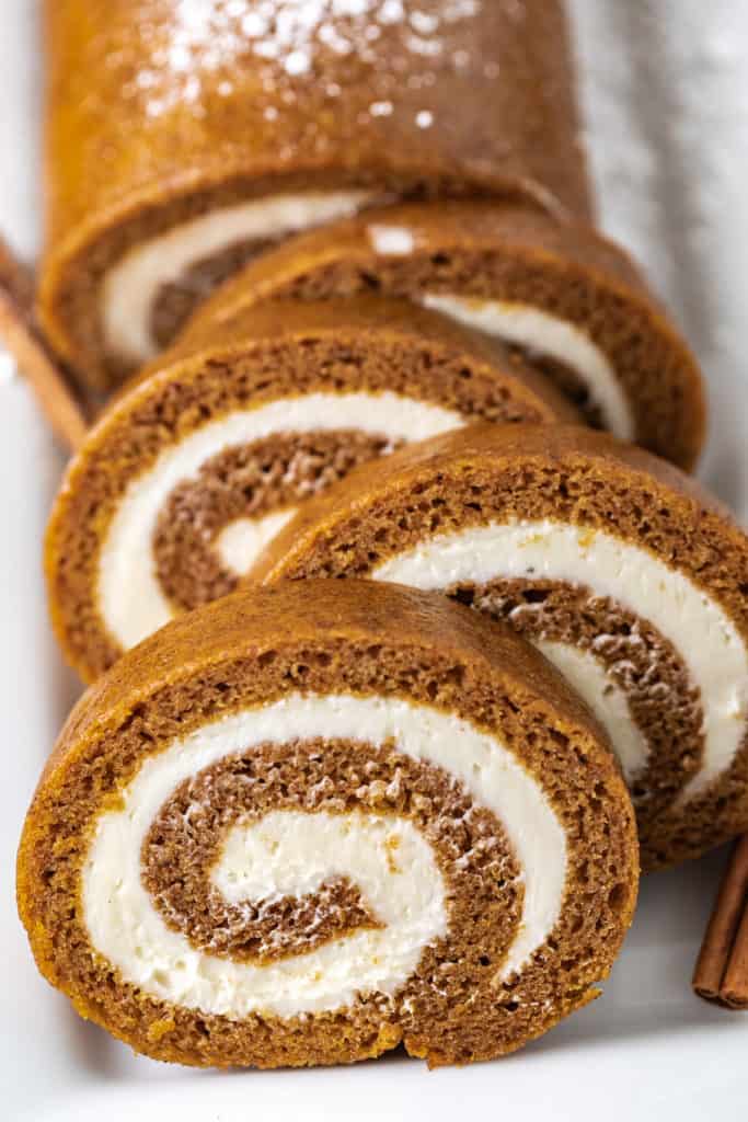 Pumpkin cake rolled with cream cheese filling.