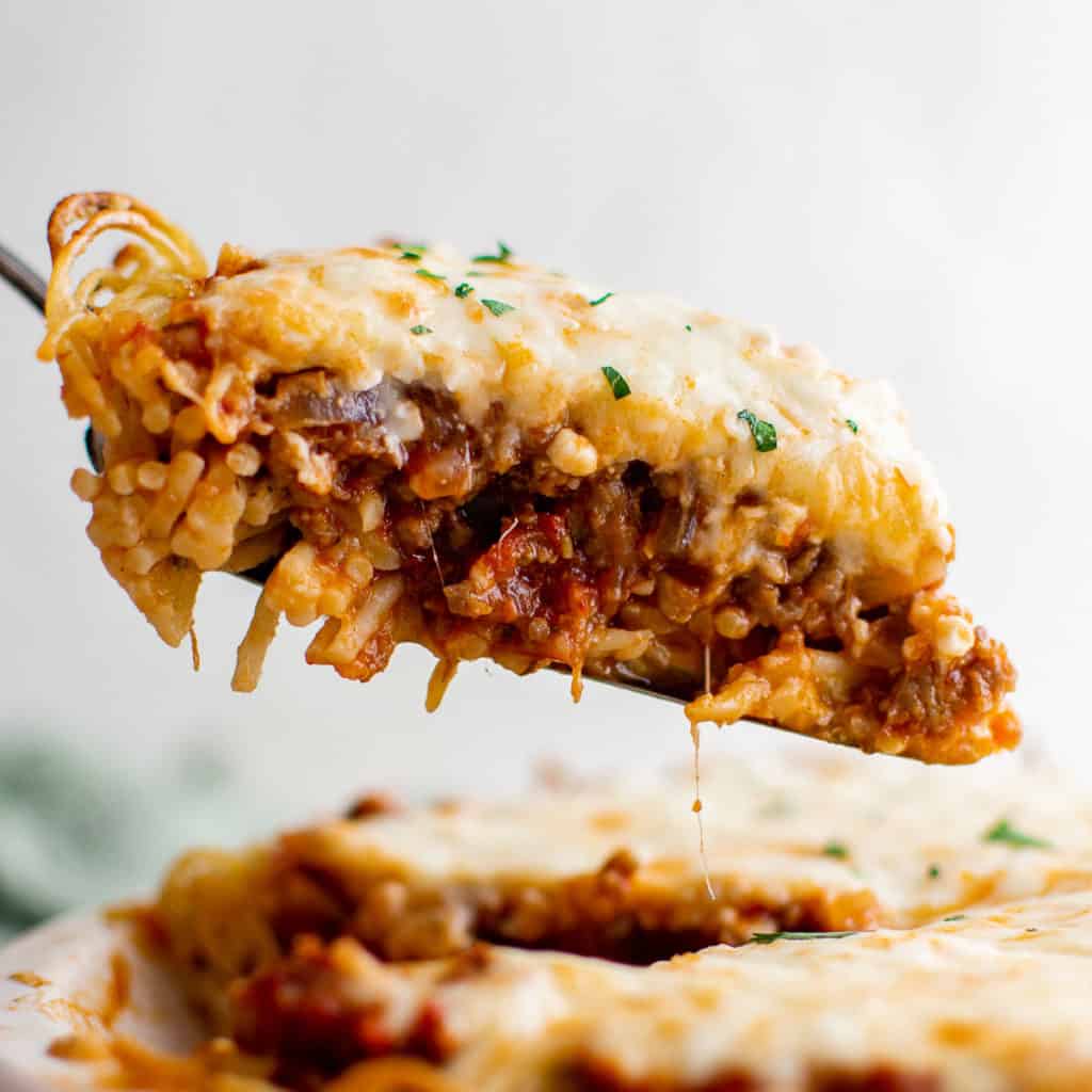 Close up view of a slice of pasta pie.