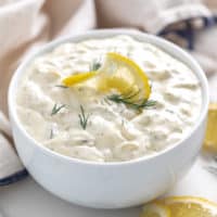 Serving bowl filled with a seafood condiment.