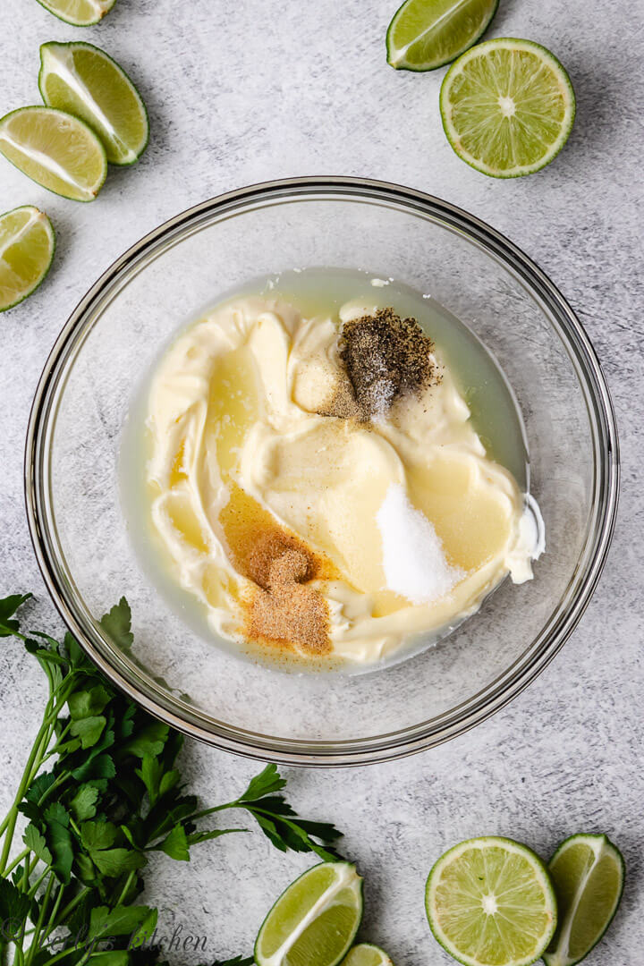 Ingredients for coleslaw dressing in a bowl.