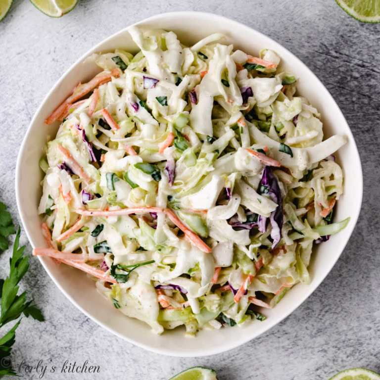 Top down view of creamy taco slaw in a bowl.