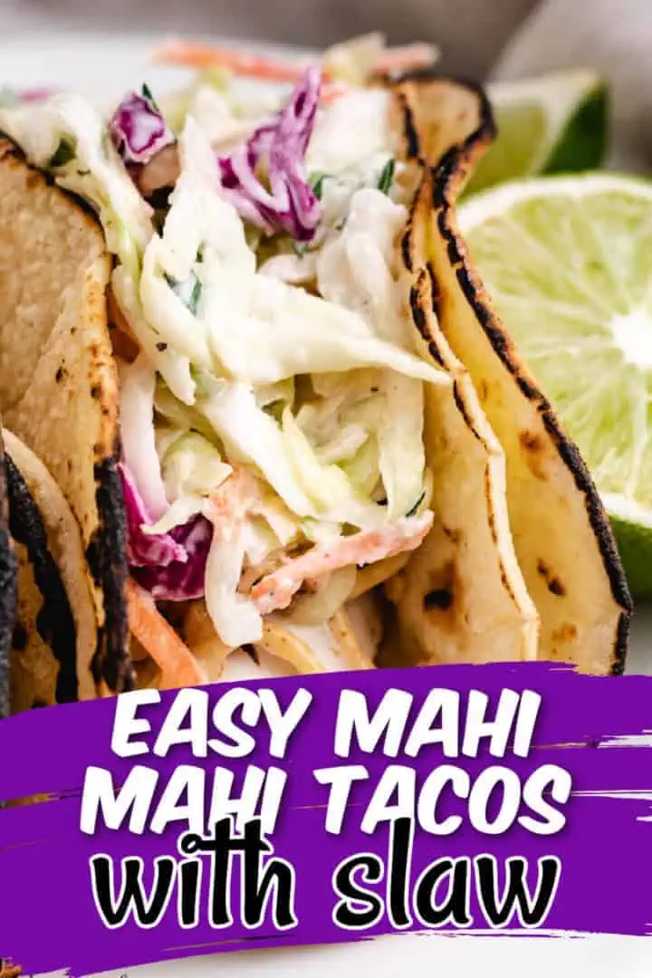 Close up view of fish tacos on a plate.