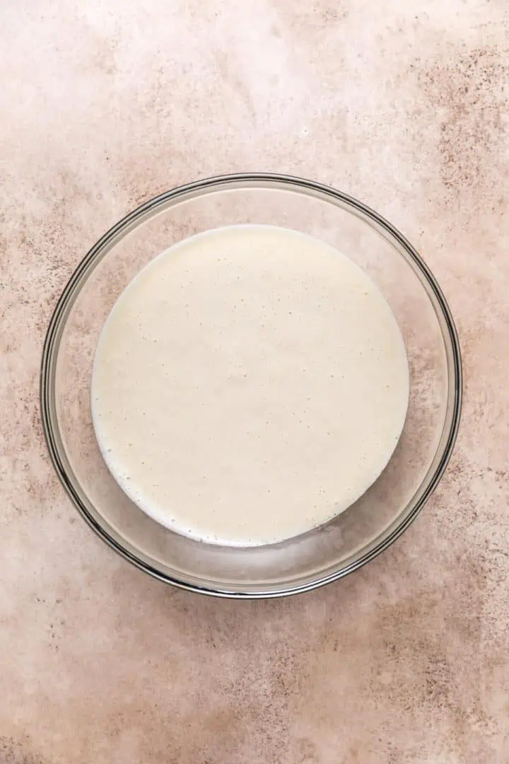 Maple cream cheese glaze in a bowl.