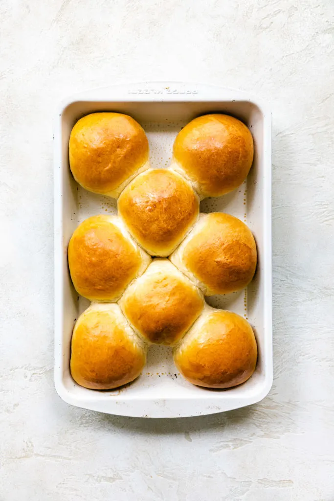 Top down view of rolls in a pan.