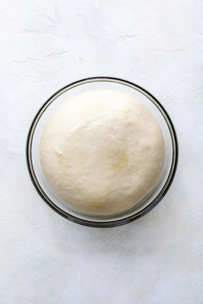 Risen dough in a bowl.