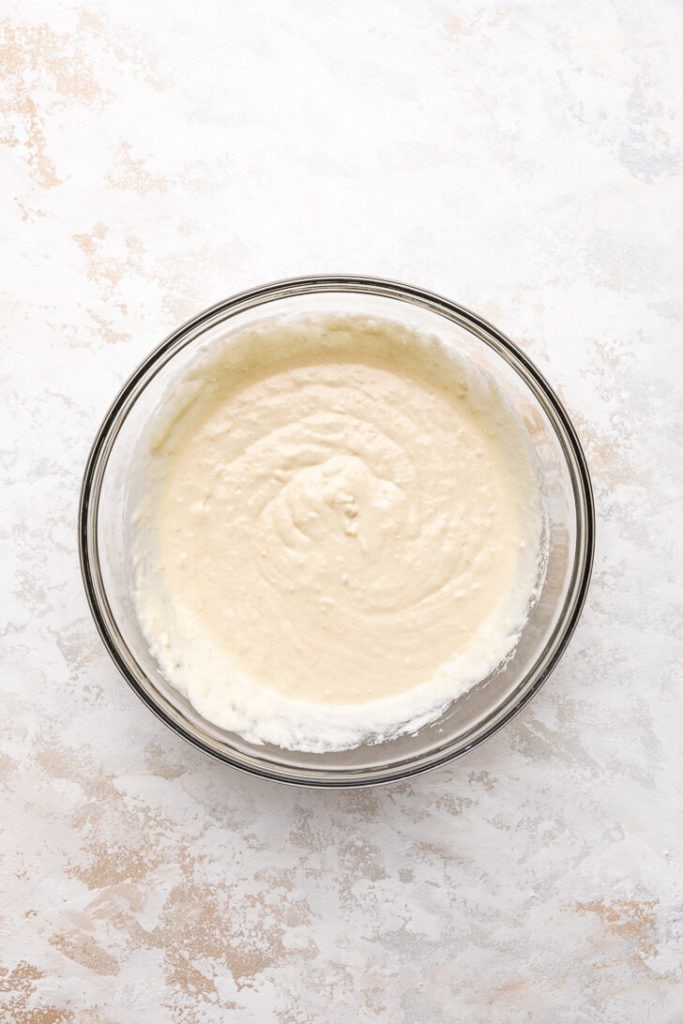 Pancake batter in a glass bowl.