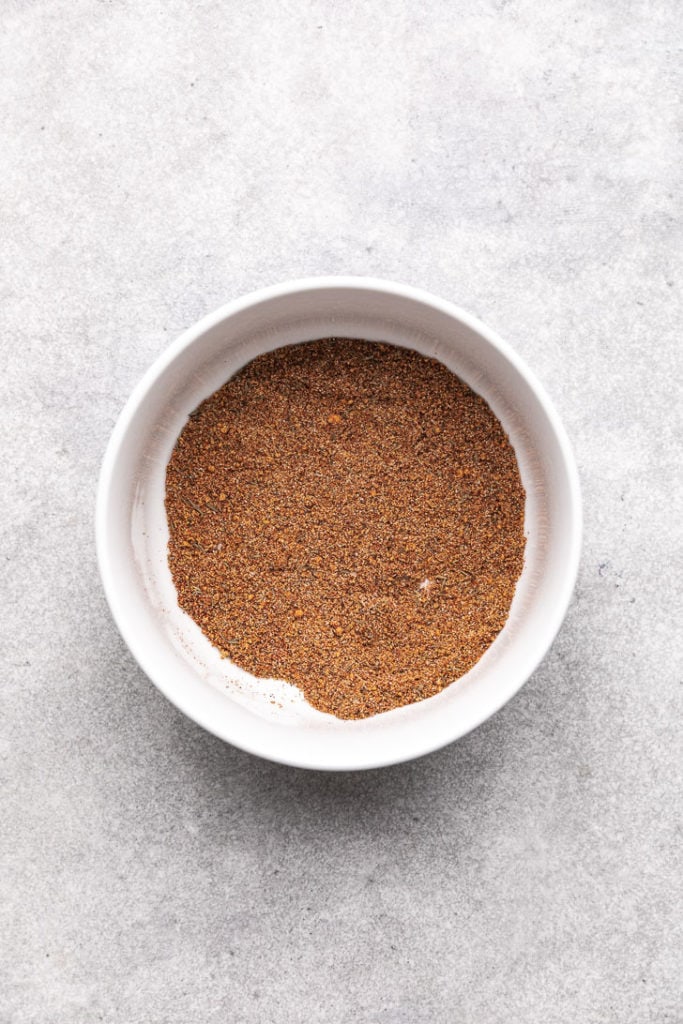 Spice blend in a white bowl.
