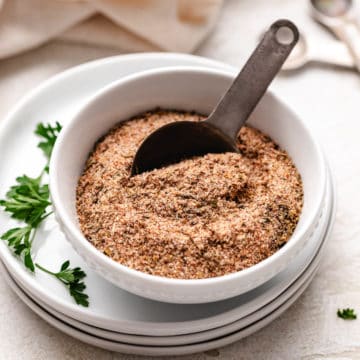 Spoon in a bowl of seasoning.