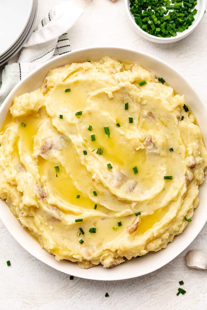 Top down view of a bowl of garlic potatoes.