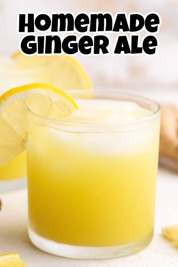 Side view of a glass of ginger soda.