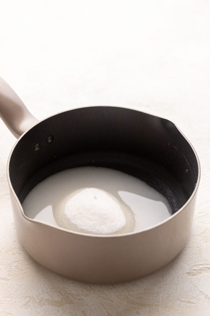 Sugar and water in a bowl.