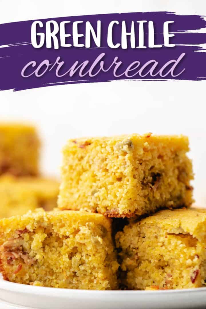 Side view of several pieces of cornbread on a plate.
