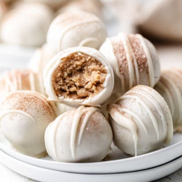 Plate of truffles with cinnamon and sugar.