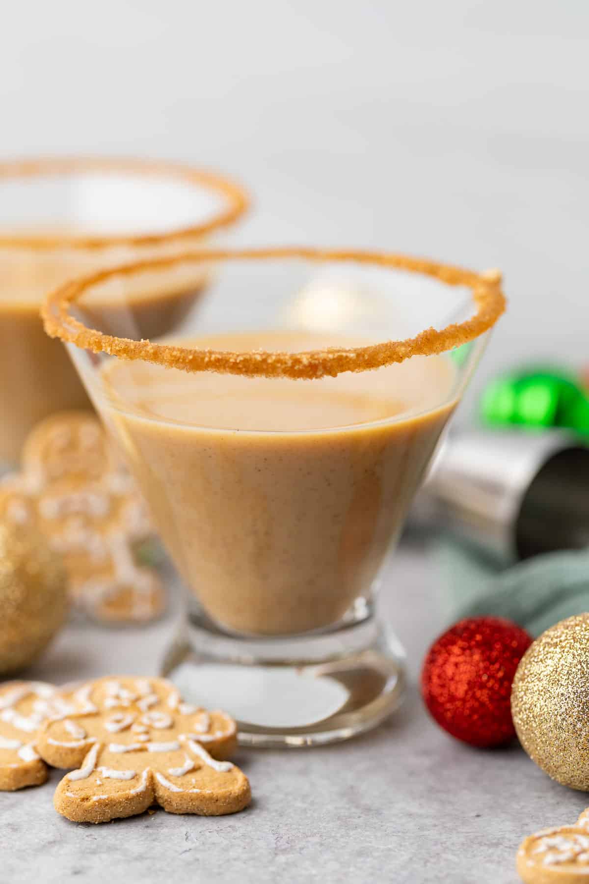 Side view of an eggnog cocktail flavored with gingerbread.