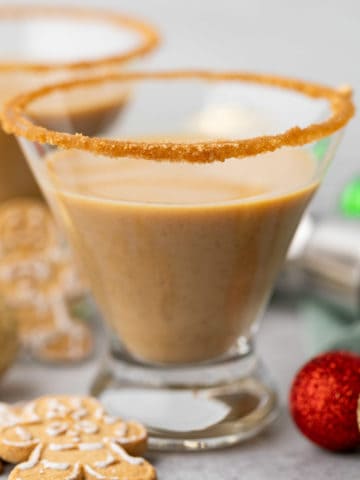 Close up view of a holiday cocktail in a glass.
