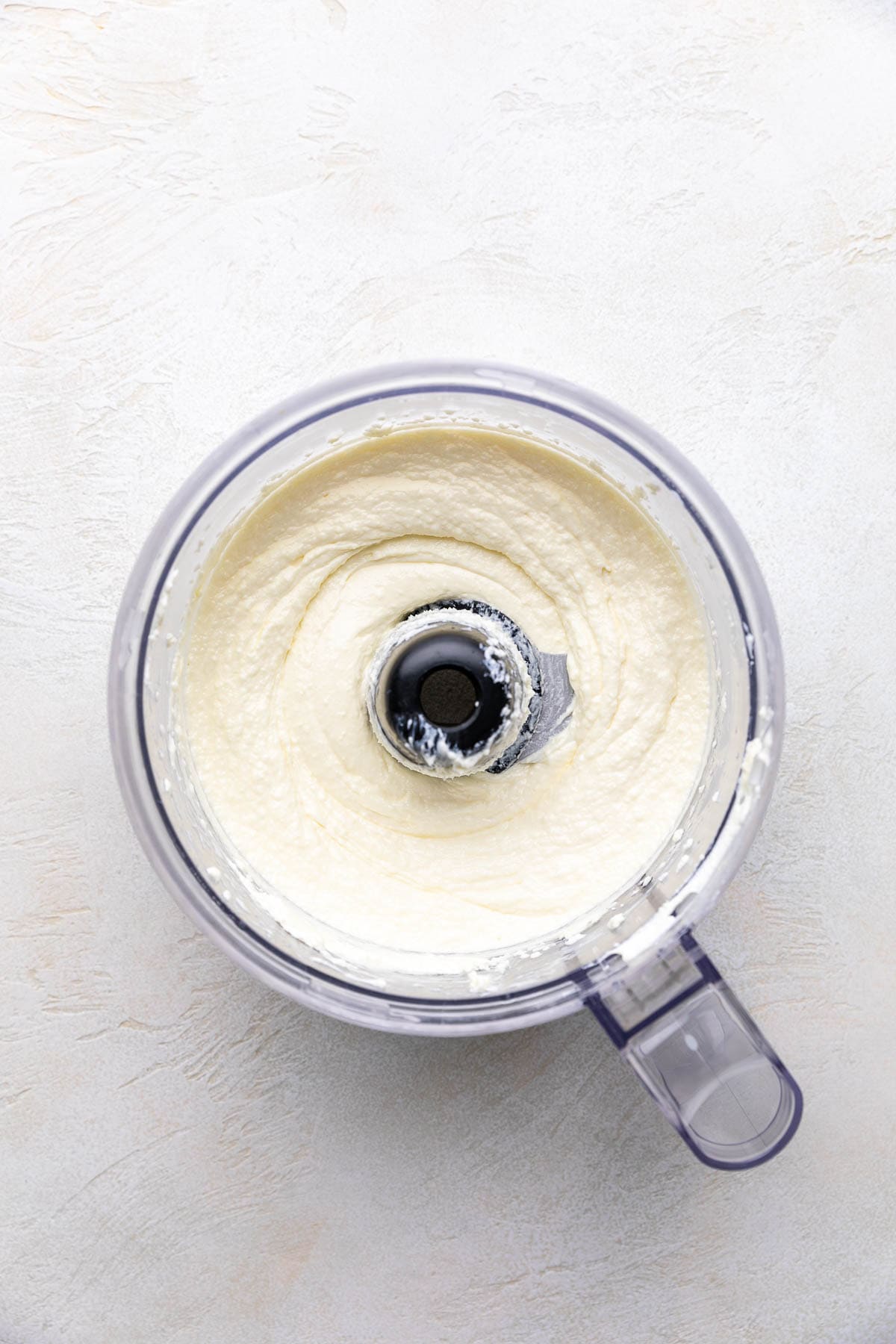 Feta cream cheese dip in a food processor.