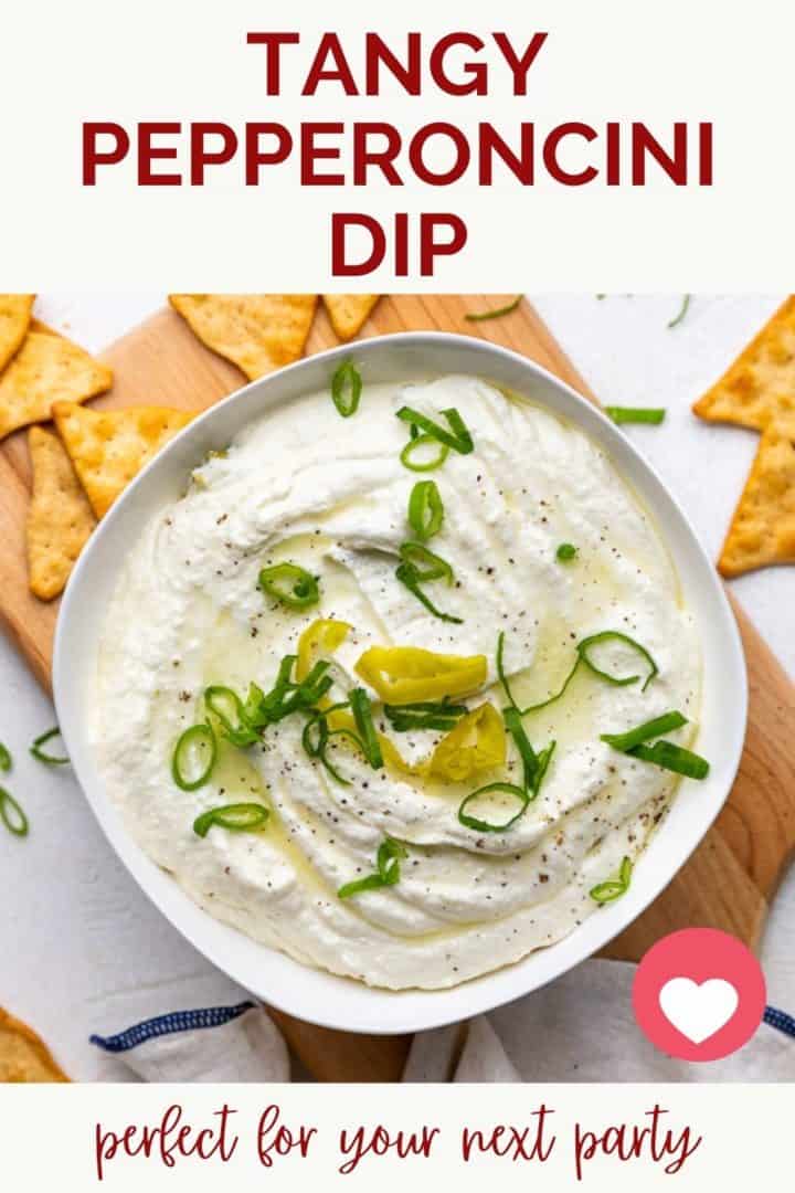 Scallions and pepperoncini on top of cream cheese dip.