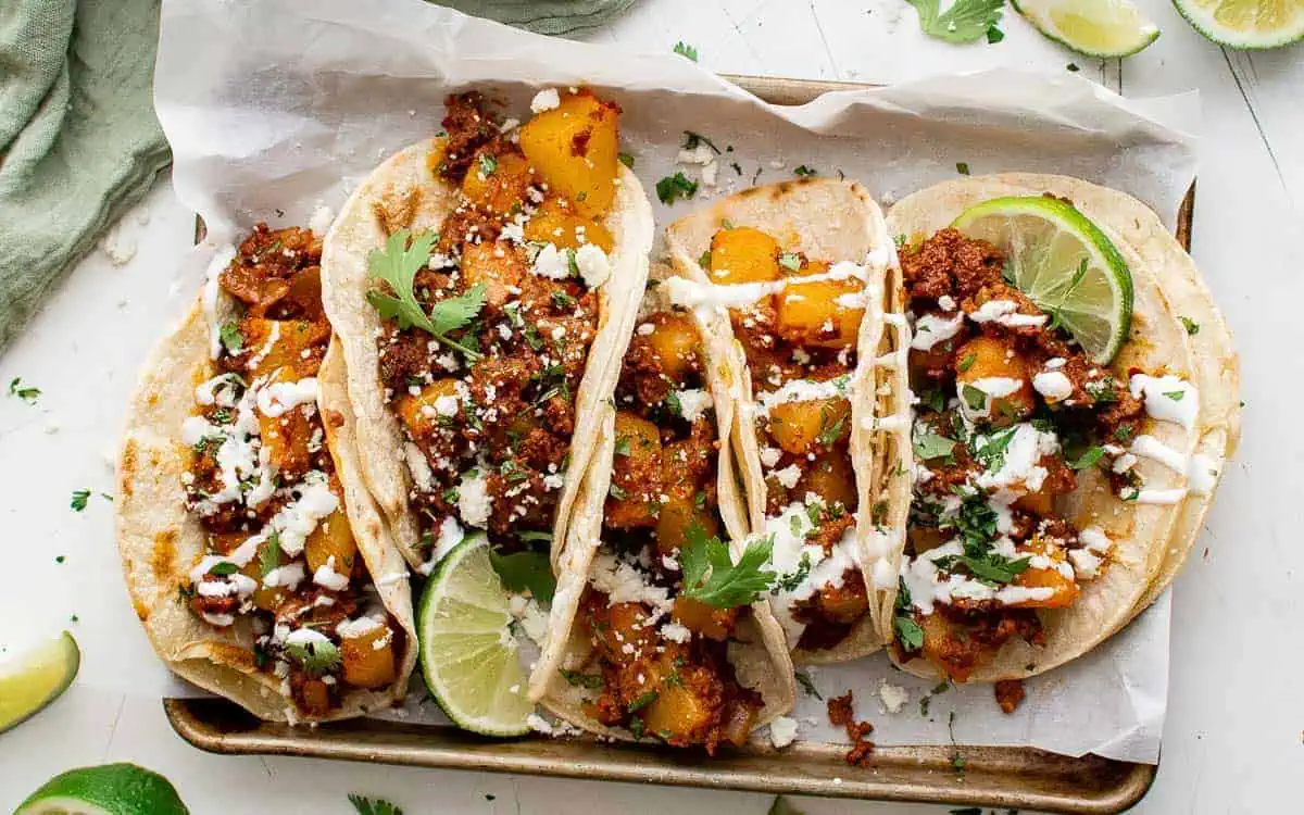 Chorizo tacos on a pan.
