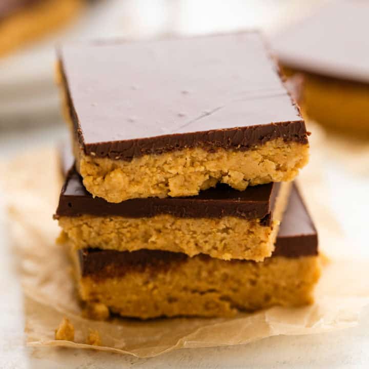Stack of 3 chocolate peanut butter bars.