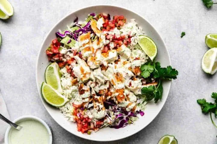Top down view fish, rice, and pico in a bowl.
