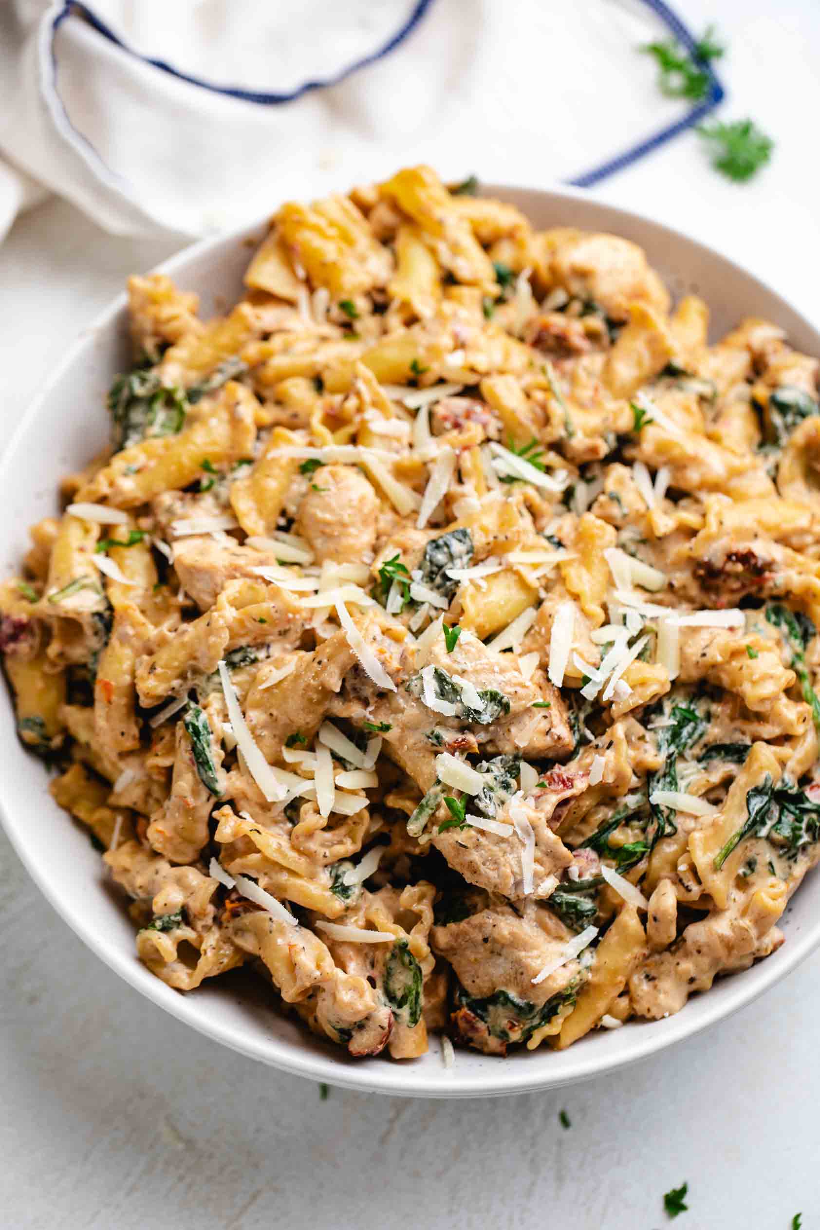 Chicken pasta with sundried tomatoes and spinach.