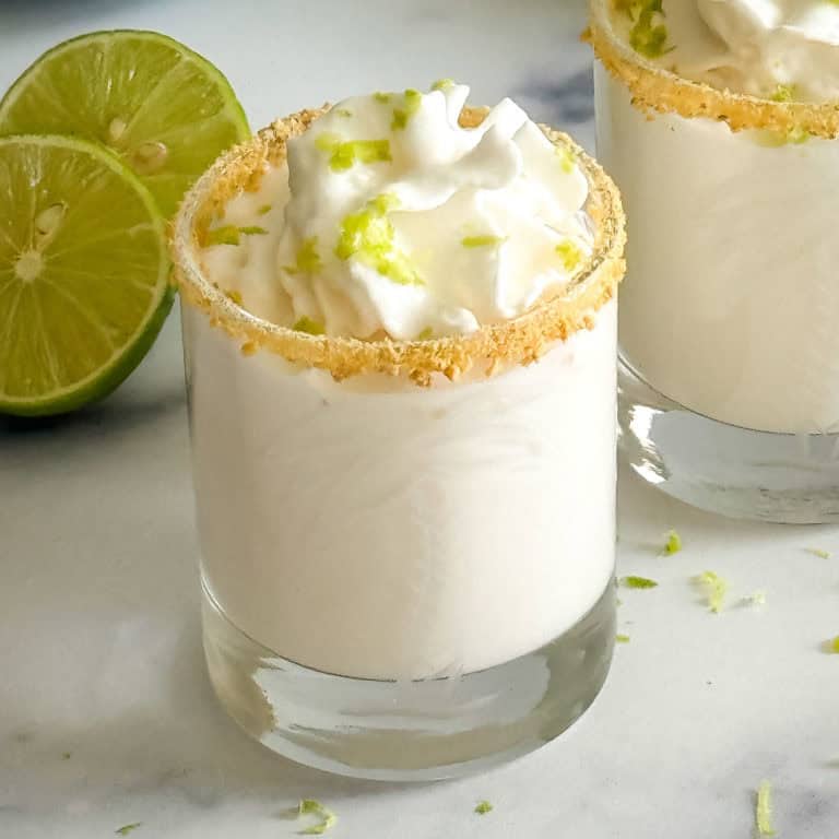 Key lime shot with whipped cream.