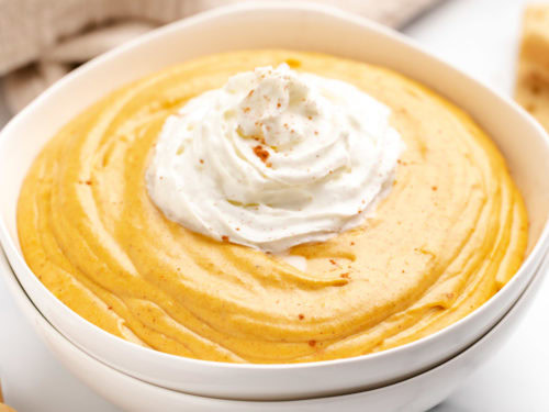 Close up view of pumpkin dip in a bowl.