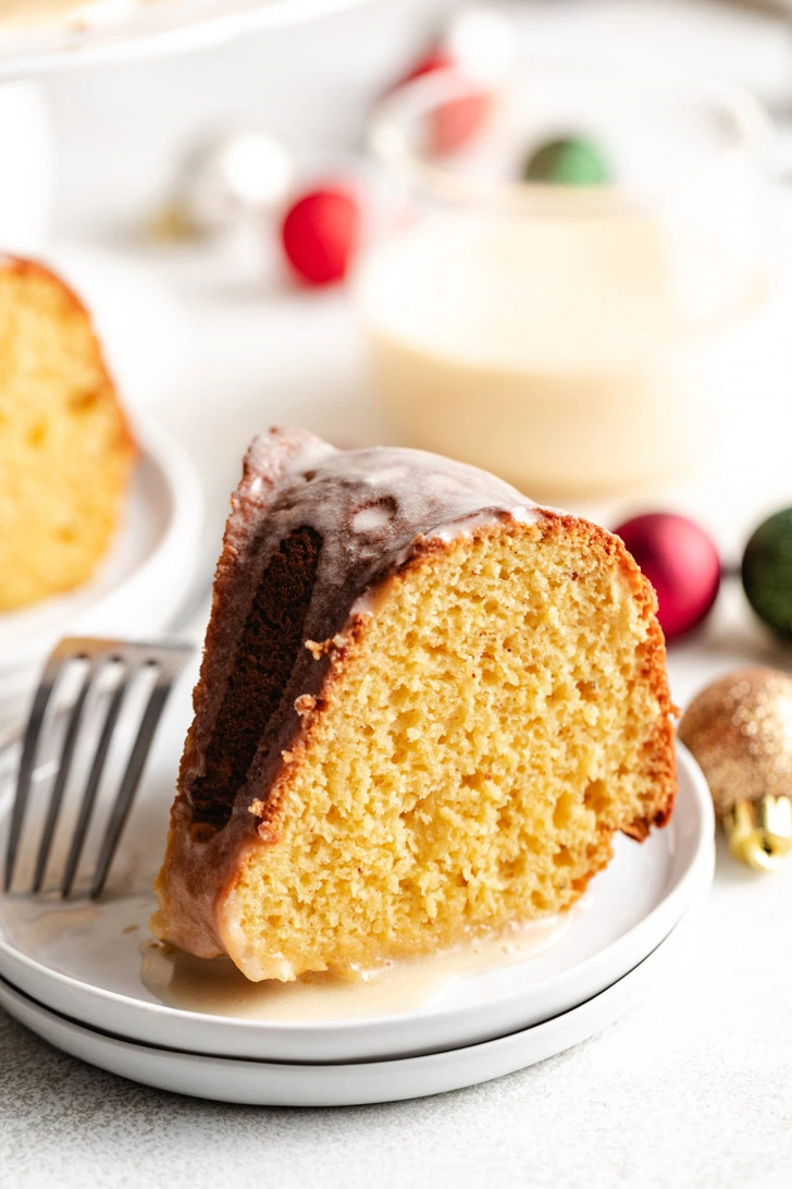 Fork next to a piece of eggnog cake.
