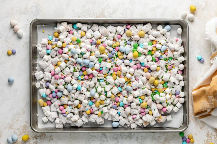 A baking sheet of easter muddy buddies.
