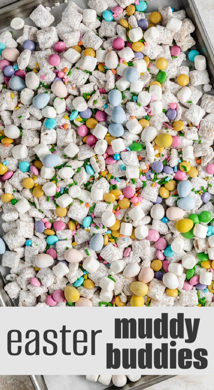 A baking sheet of cereal with candy and marshmallows.