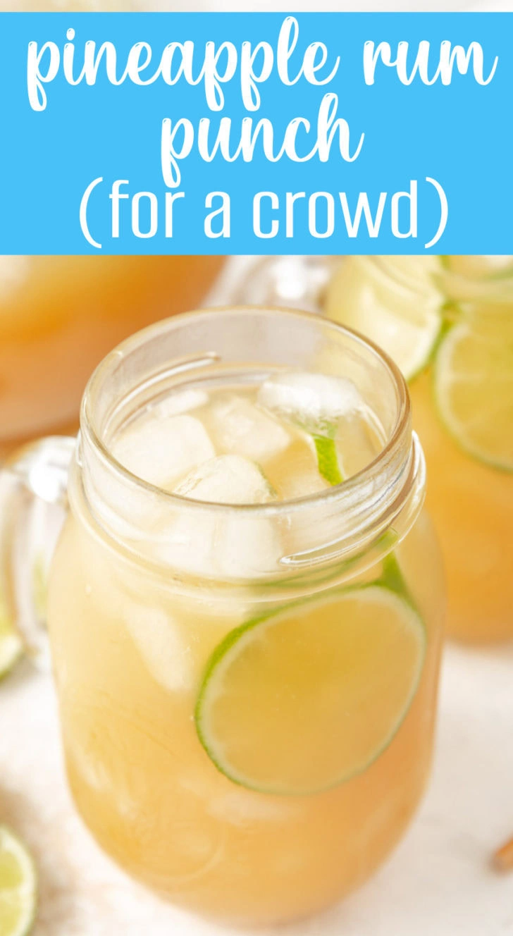 Mason jar filled with rum punch.