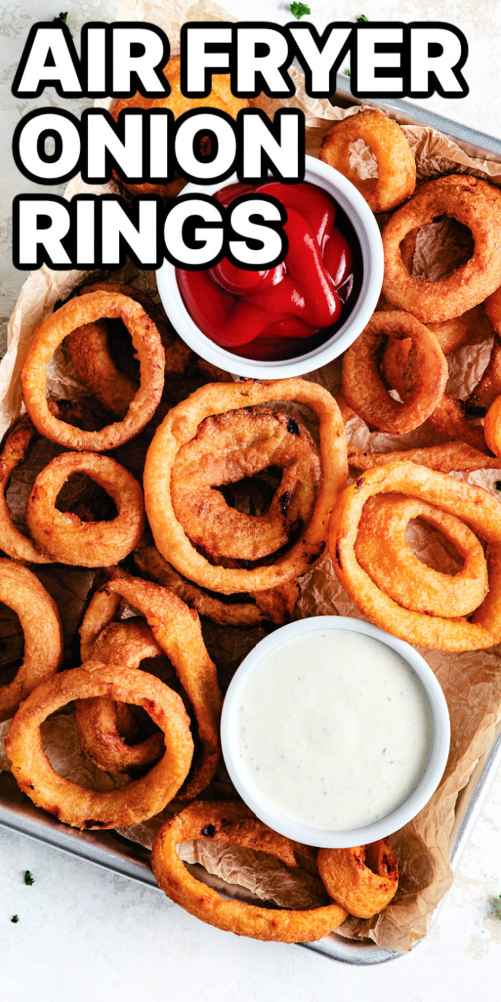 A plate of fried onion rings and sauces