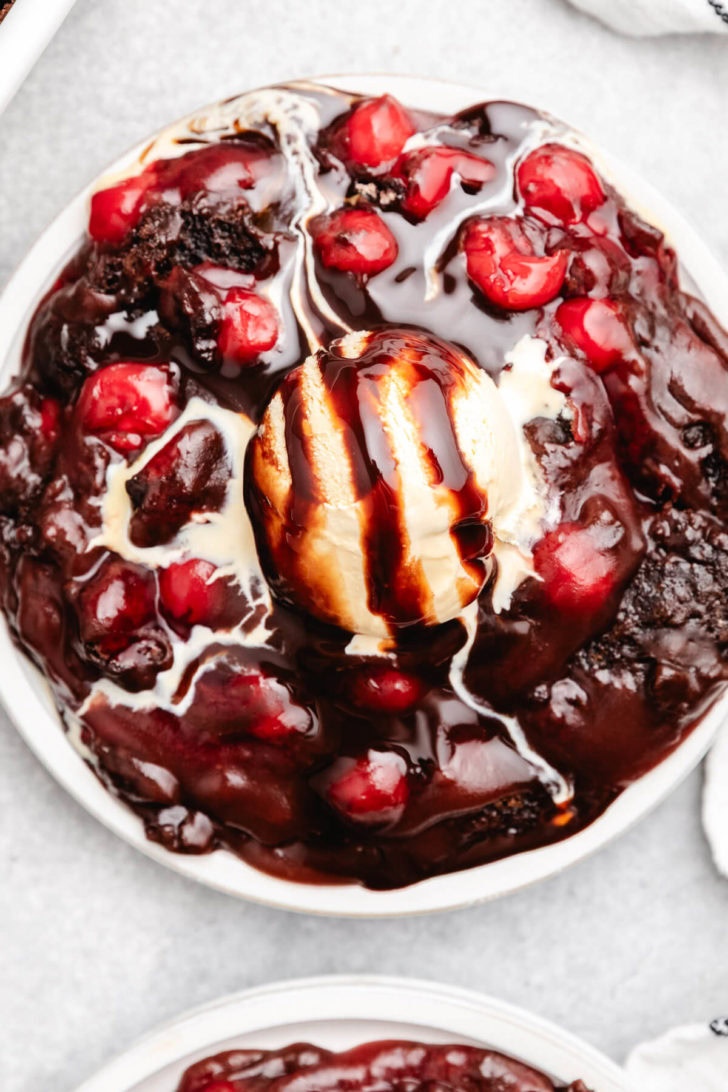 Chocolate syrup drizzled over cake.