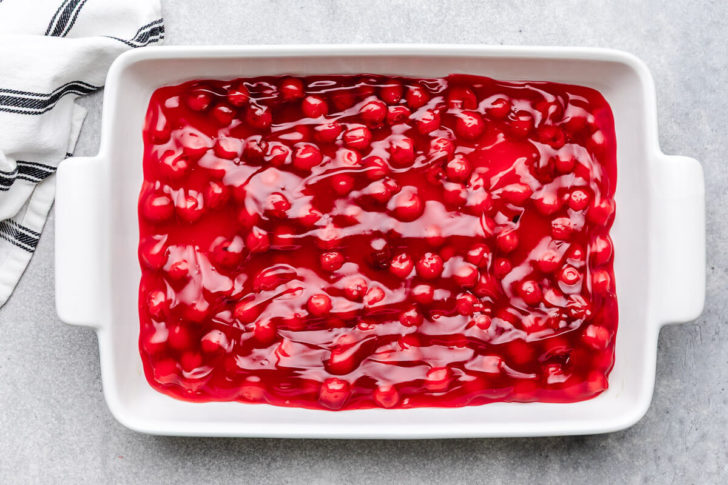 Cherry pie filling in a pan.