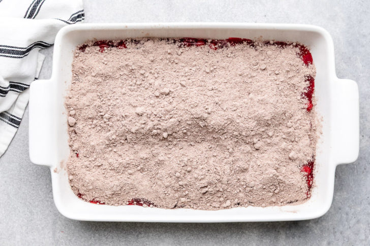 Cake mix sprinkled over pie filling.